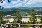 Old Faithful from overlooking hill